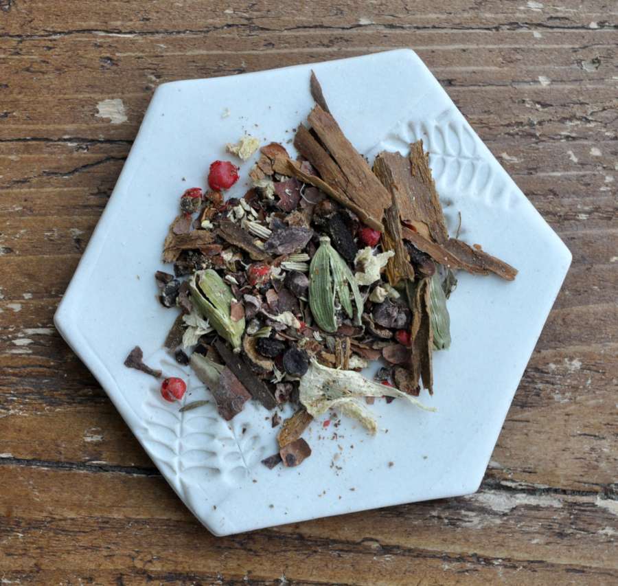 Assorted tea ingredients on a plate